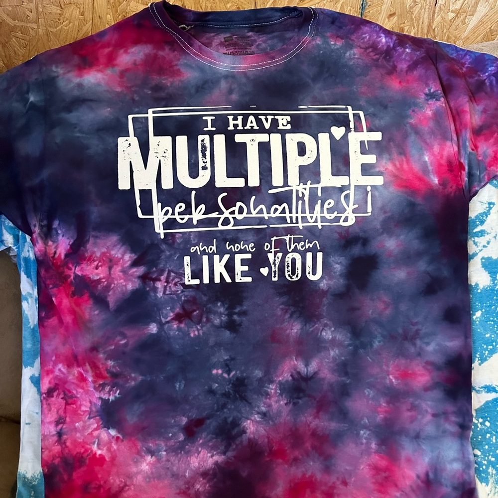 Multiple personalities tie dye tee